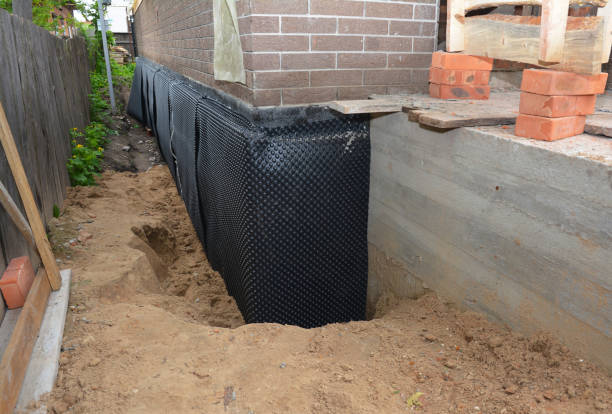 Happy homeowners after waterproofing job in Fort Mill